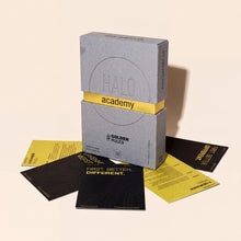 HALO GoldenRules Box auf aufgefächerten Regelkarten, darunter die Karte „First. Better. Different.“